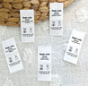 Satin label reading Made with Love sewn into handmade knitwear